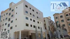 Building for sale on a main street, strategic area in Al Jurf 2