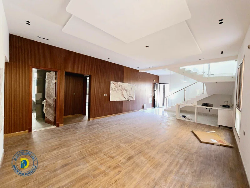 Modern villa, prime location, for sale in Rawda 1 area. The price includes water and electricity. Freehold for all nationalities.63874581582339113
