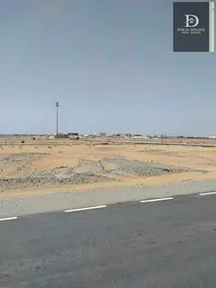 For sale in Sharjah, Al-Sahmah area, Al-Ruwaidat suburb, residential land with an area of ​​2420