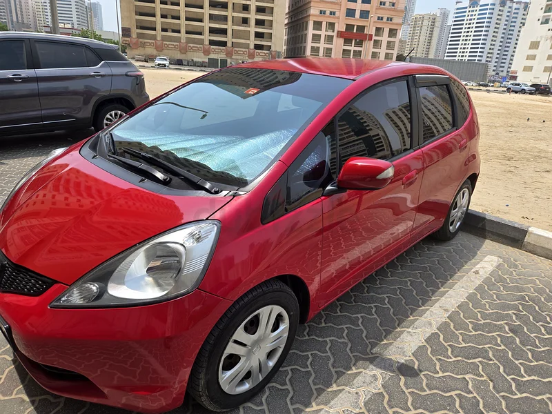 هوندا جاز حمراء، بدون حوادث، مع طلاء أصلي.63223314353026111