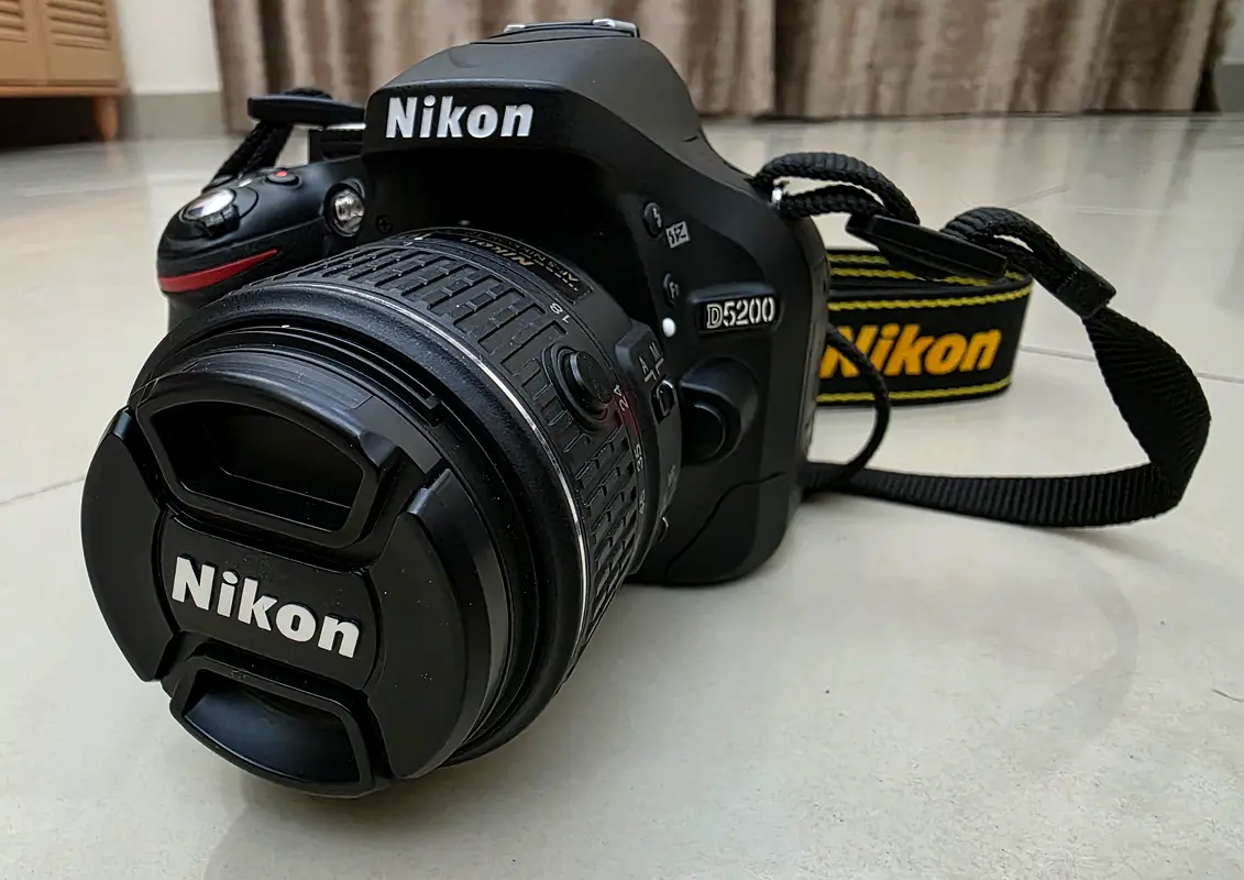 Nikon D5200 DSLR Camera with 18-55mm VR2 Lens and Accessories for Sale in Excellent Condition