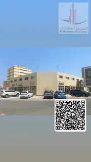 Shop for annual rent in Al Jurf Industrial City, excellent location on a main street