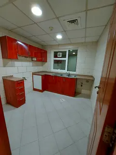 Parking Free Spacious 1 BHK 38K in Family Building Opposite Sahara Center Al Nahda Sharjah Call Khur