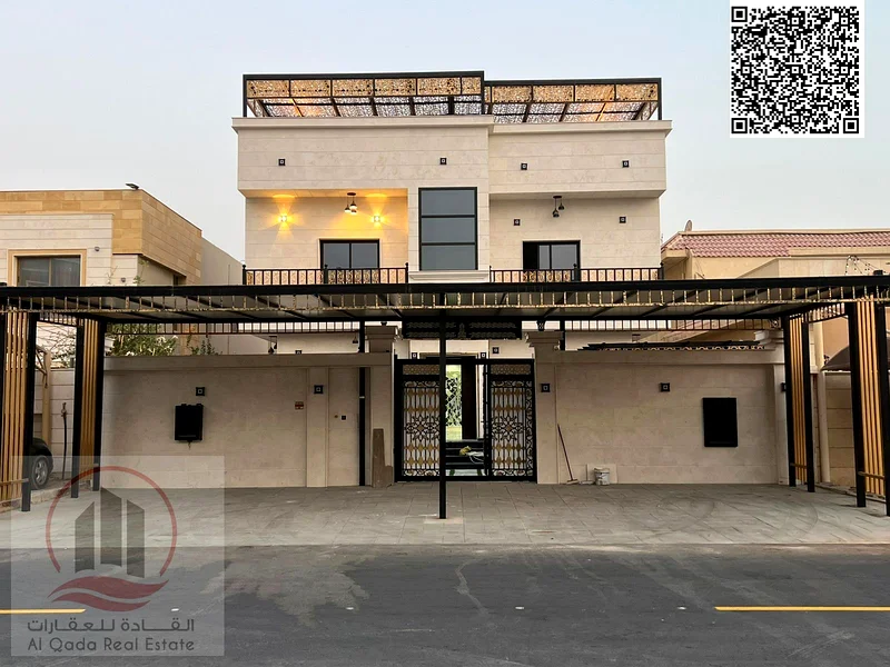 Villa for sale in Ajman, Al Muwaihat 1 area, ground floor, first floor and roof, including electricity, water and air conditioning (swimming pool + 763869383455233110