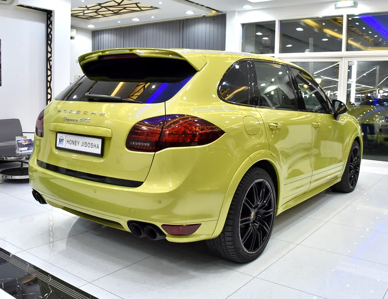 EXCELLENT DEAL for our Porsche Cayenne GTS (2013 Model) in green color, GCC specs63150023122945114