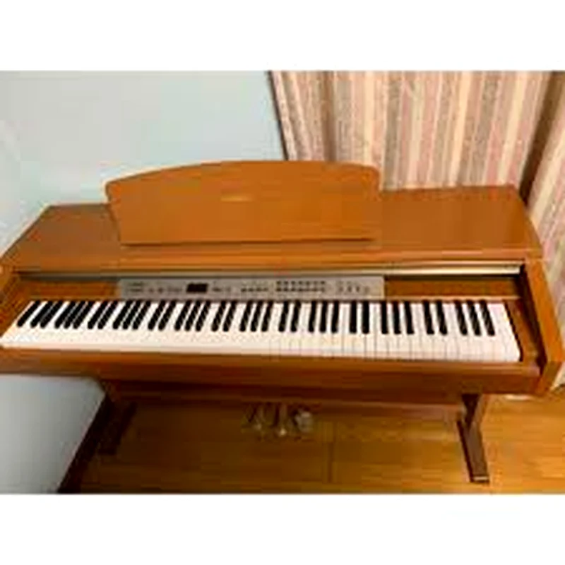 Yamaha YDP223 piano having 88 weighted keys .63202681431426111