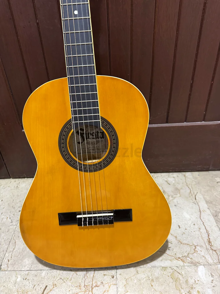 Wooden guitar by Haj Asghar for beginners in excellent condition63229302106115111