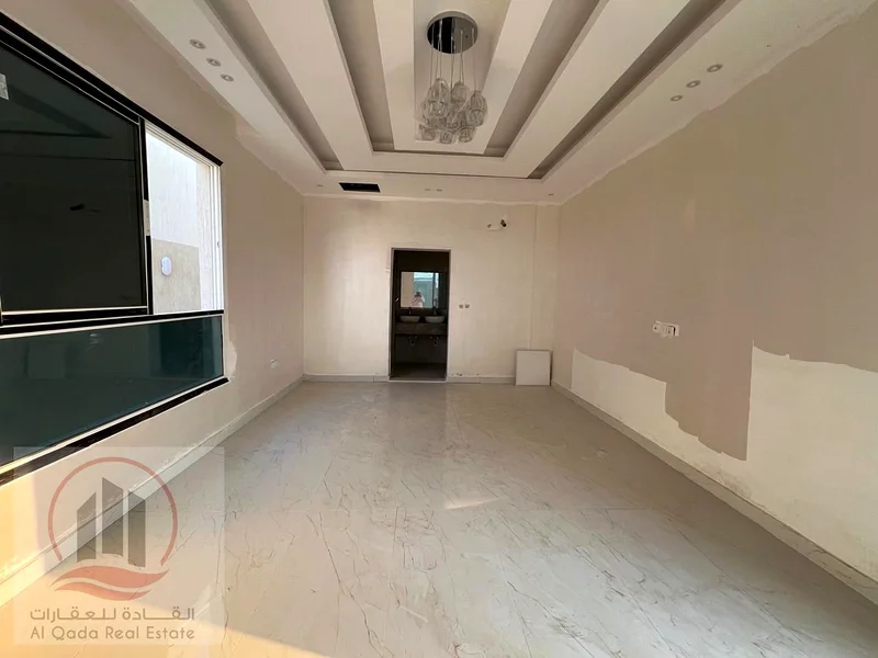 For sale: A villa in Ajman, Al Helio, with 4 master bedrooms, a majlis, 2 living rooms, and a maid's room. Freehold for all nationalities. Bank financ63891799496577114