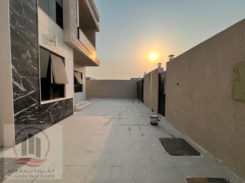 For sale: A villa in Ajman, Al Helio, with 4 master bedrooms, a majlis, 2 living rooms, and a maid's room. Freehold for all nationalities. Bank financ63891799496577111