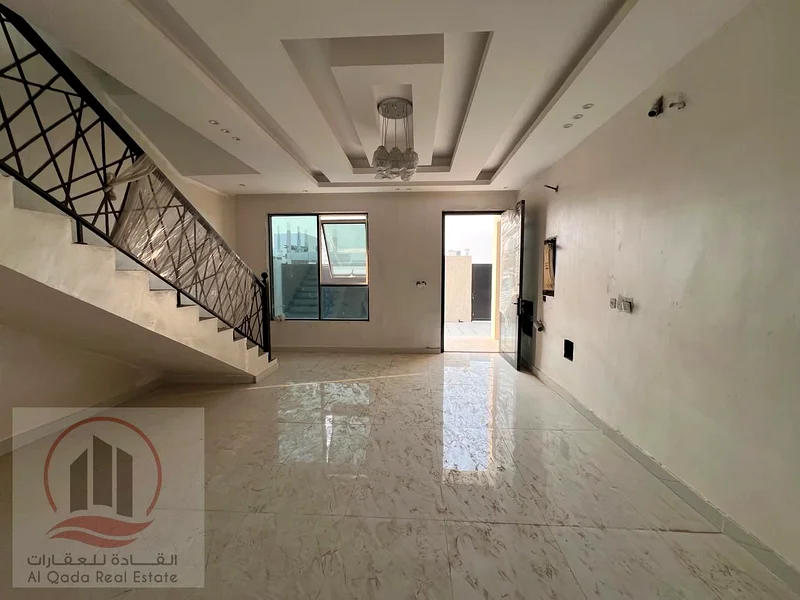 For sale: A villa in Ajman, Al Helio, with 4 master bedrooms, a majlis, 2 living rooms, and a maid's room. Freehold for all nationalities. Bank financ63891799496577112