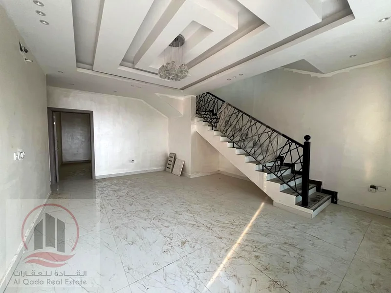 For sale: A villa in Ajman, Al Helio, with 4 master bedrooms, a majlis, 2 living rooms, and a maid's room. Freehold for all nationalities. Bank financ63891799496577113