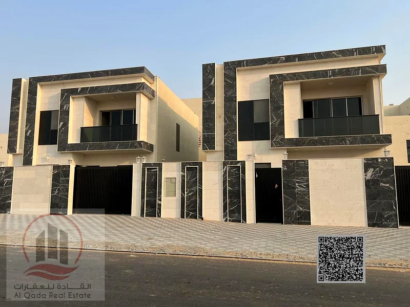 For sale: A villa in Ajman, Al Helio, with 4 master bedrooms, a majlis, 2 living rooms, and a maid's room. Freehold for all nationalities. Bank financ63891799496577110