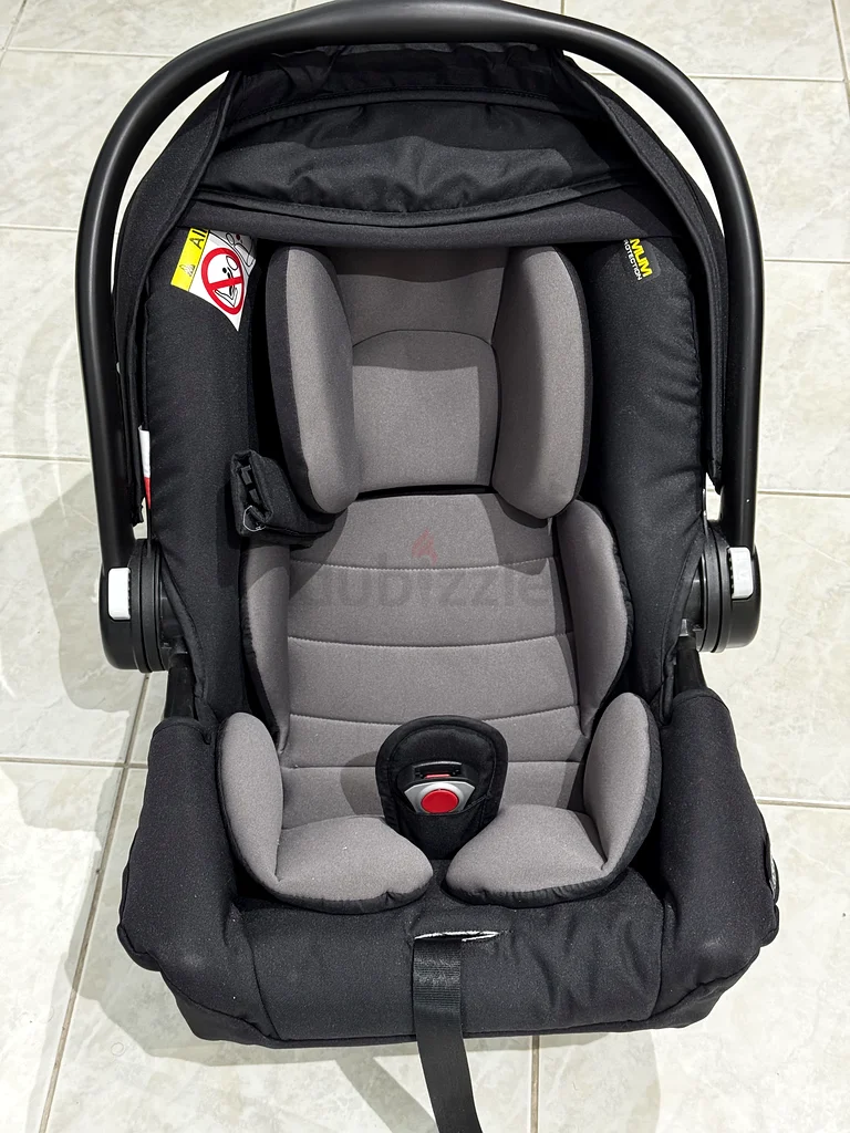 مقعد سيارة للأطفال من Graco SnugEssentials بحجم F (0-12 شهرًا)63204285564289111