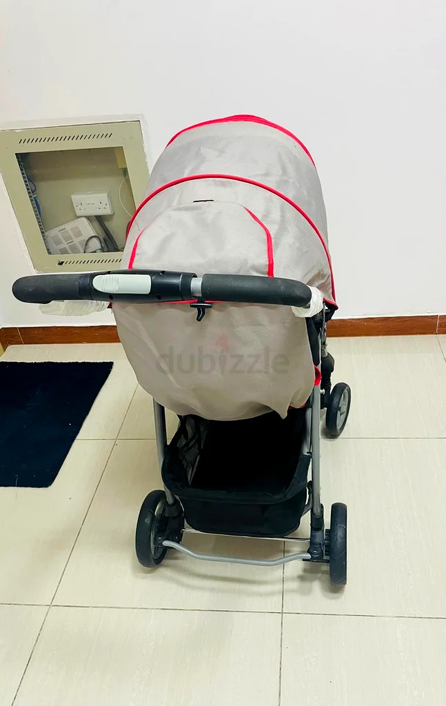 عربة أطفال بمقعد مبطن وناعم مع عدة وضعيات للإمالة632058857182751126
