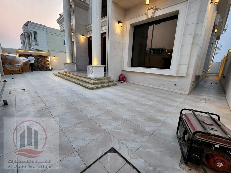 Villa for sale in Al Alia, Ajman, area 4300 square feet (5 rooms + majlis + hall + large courtyard + equipped kitchen + maid's room)63877378185858112