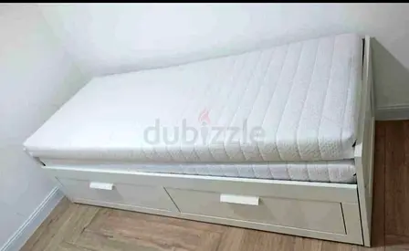 IKEA brimness Day bed with 2 storage drawers underneath and with 2 IKEA mattresses