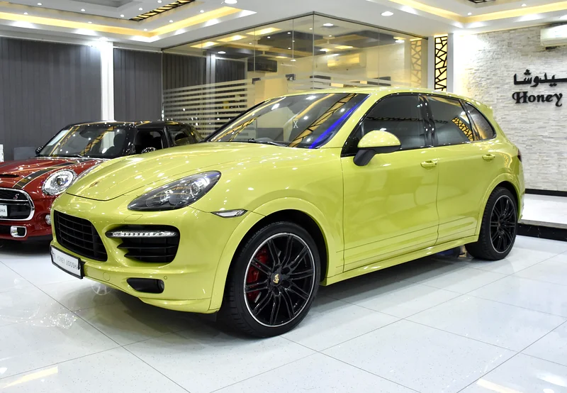 EXCELLENT DEAL for our Porsche Cayenne GTS (2013 Model) in green color, GCC specs63150023122945111