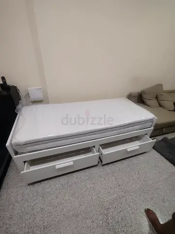 IKEA brimness Day bed with 2 storage drawers underneath and with 2 IKEA mattresses