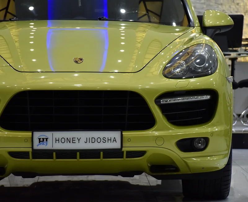 EXCELLENT DEAL for our Porsche Cayenne GTS (2013 Model) in green color, GCC specs63150023122945113