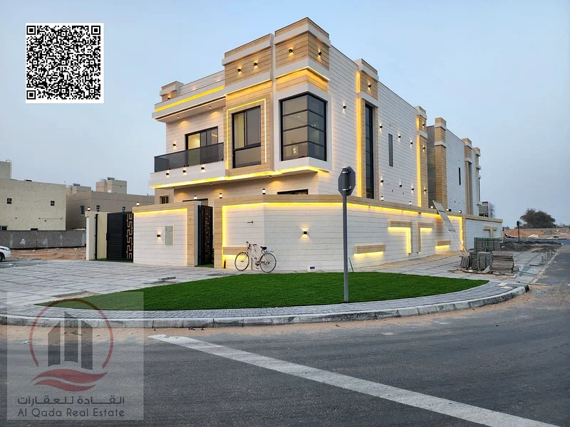 Corner villa for sale in Ajman, Al Helio 2 area, including registration fees, ground floor, first floor, and roof (5 master bedrooms + majlis + hall +63891799478402110