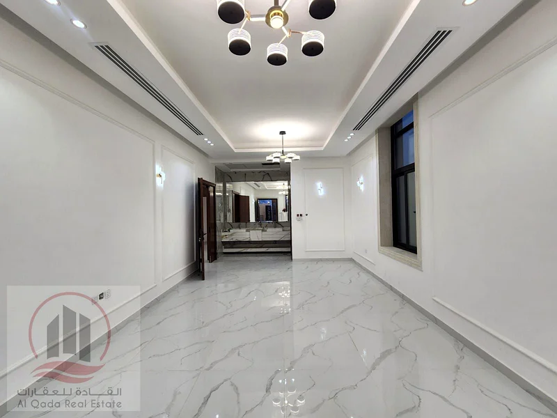 Corner villa for sale in Ajman, Al Helio 2 area, including registration fees, ground floor, first floor, and roof (5 master bedrooms + majlis + hall +63891799478402114