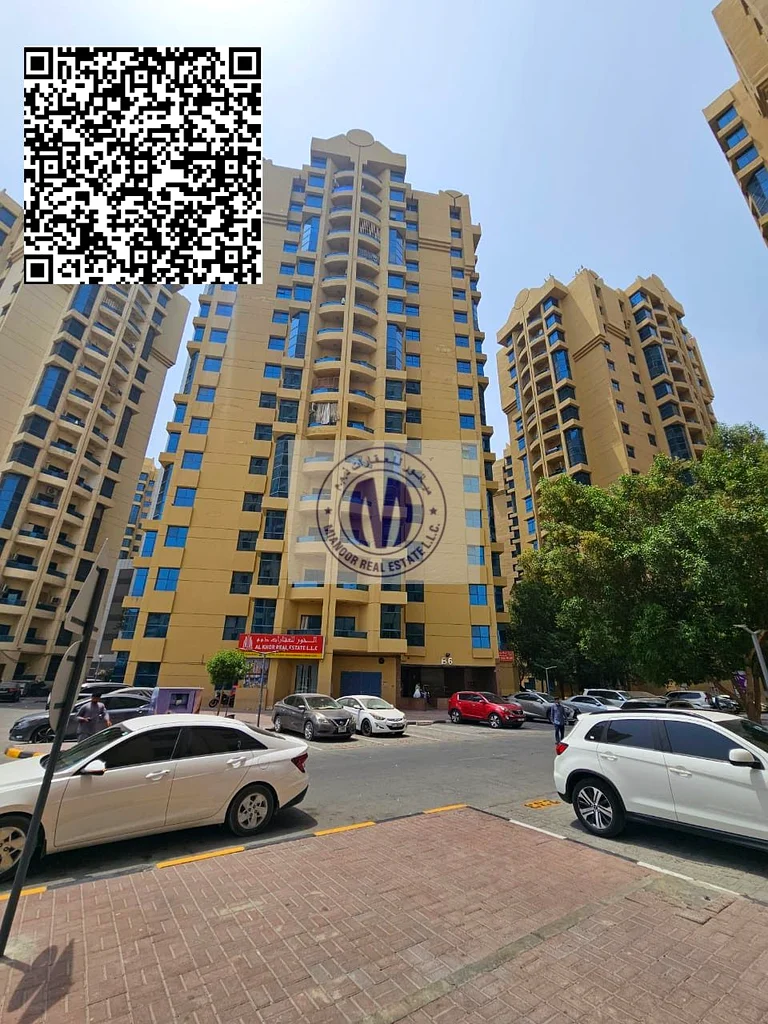 شقة فسيحة فارغة مكونة من غرفتي نوم ومجلس متاحة للبيع في أبراج الخور، عجمان...63256057963779110