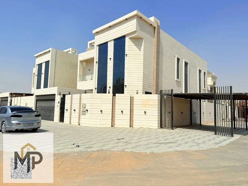 Villa for sale, corner of two streets, new, stone, in the Al Muwaihat 1 area, Ajman - freehold - negotiable, with water, electricity, air conditioners63869495736963111