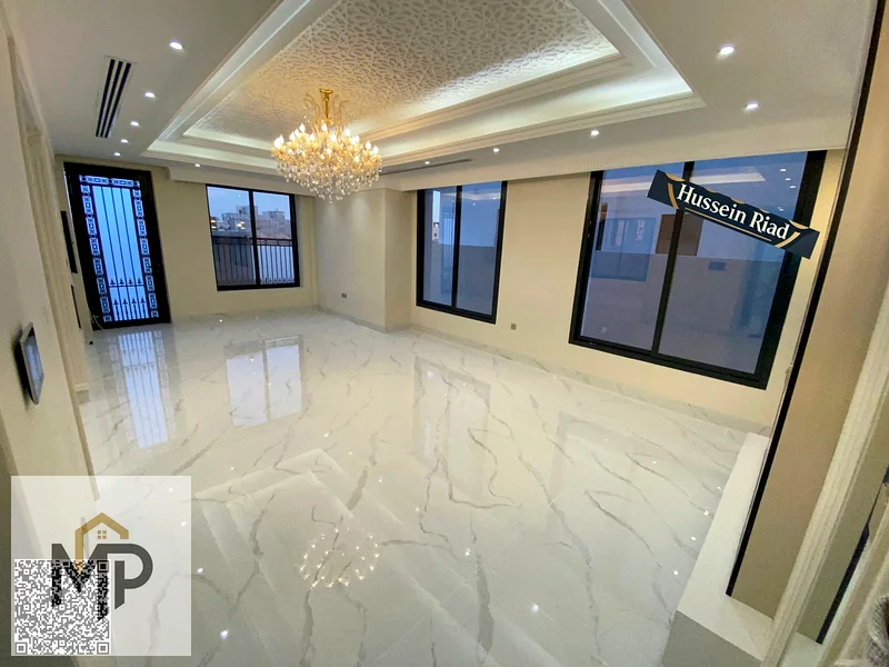 فيلا فاخرة بتصميم كلاسيكي في موقع متميز أمام مجمع أزها، وبسعر يشمل رسوم التسجيل ورسوم الملكية.63893336785155113