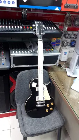 Epic Black Electric Guitar - Perfect for Rock Enthusiasts!