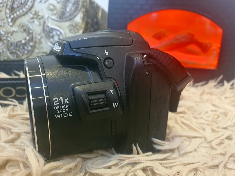 كاميرا نيسان COOLPIX L120 الرقمية بدقة 14.1 ميجابكسل مع عدسة زووم ضوئية واسعة الزاوية NIKKOR بقدرة 21x، وشاشة LCD بحجم 3 بوصات63235113520385113