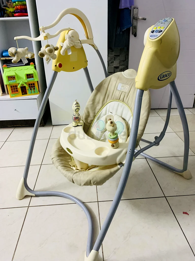 Gentle Rocking Baby Swing with Play Toys - Comfort  Fun!63204260216451112