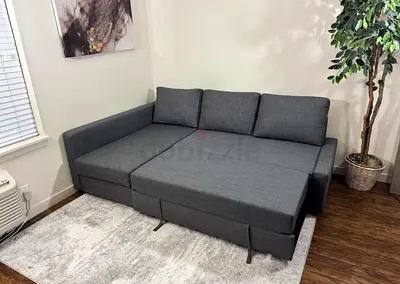 Selling ikea L shape sofa cum bed with storage