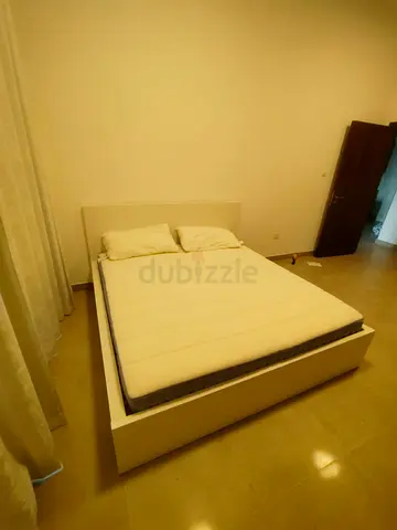 IKEA Malam king size bed frame with IKEA mattress 180×200cm is available in excellent condition,