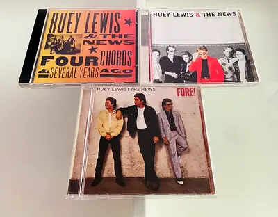 3 Huey Lewis Music CD’s