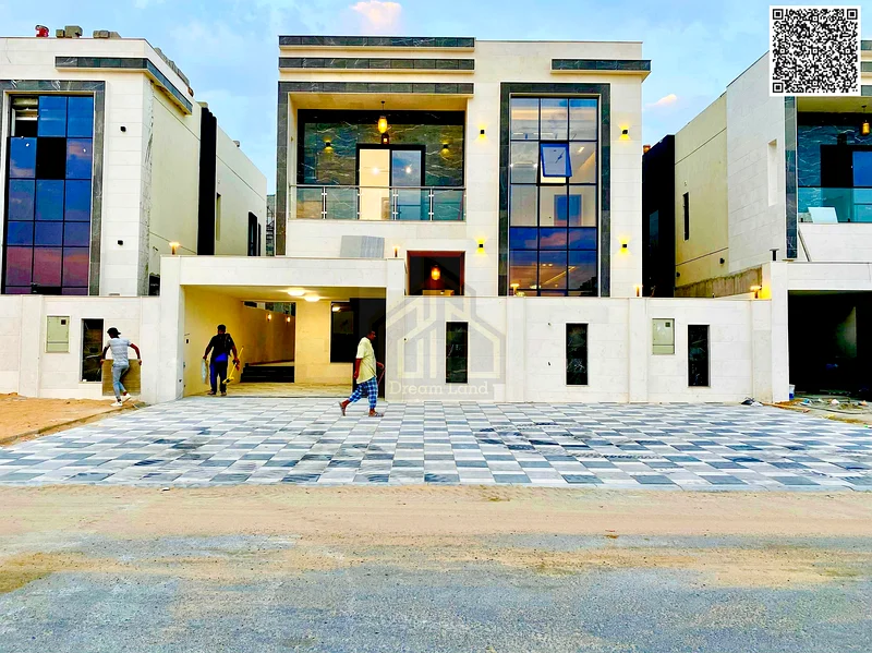 For sale, a villa in Ajman Al Helio, 5 master bedrooms, a majlis, a hall, and a maid’s room. Freehold for all nationalities, with the possibility of b63892120859009110