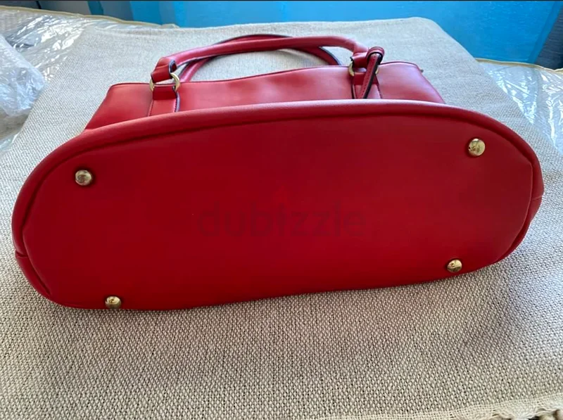حقيبة نسائية (مستعملة)63237607224066112