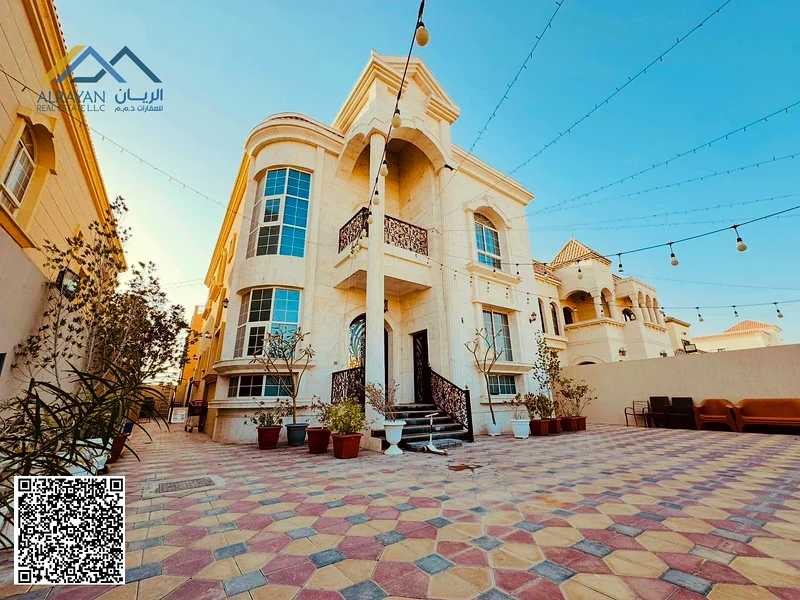 For sale, a new luxurious villa, a prime location - very excellent finishing - a large building area - freehold Al Muwaihat 1, including electricity,63869495651843113