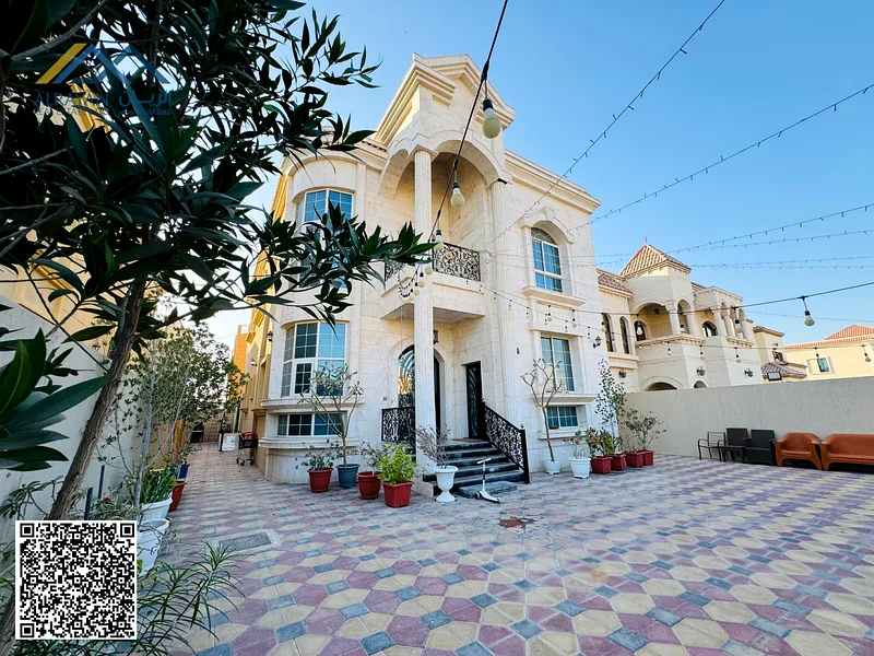 For sale, a new luxurious villa, a prime location - very excellent finishing - a large building area - freehold Al Muwaihat 1, including electricity,63869495651843111