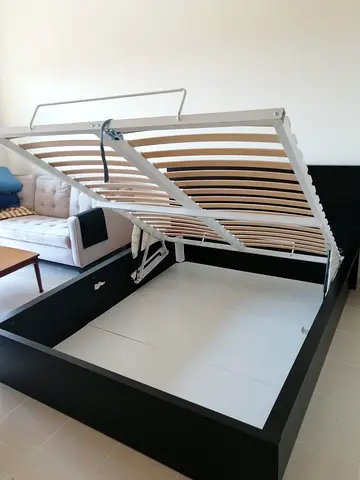 Ikea king size hydraulic bed with Ikea mattress  is available in excellent condition, not a single s
