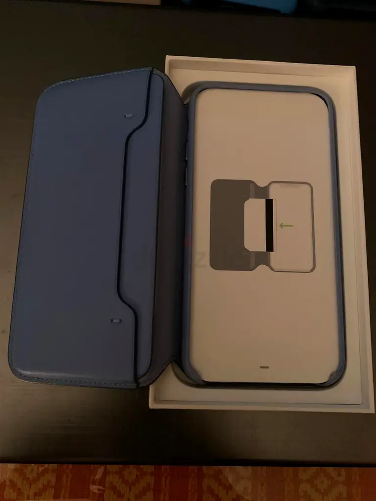 جراب أصلي من Apple لهاتف iPhone X أو Xs، مصنوع من الجلد وله تصميم محفظة، للبيع
