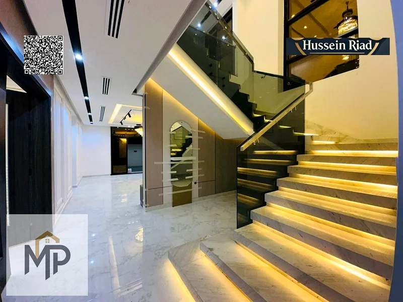 For sale, a modern villa, including registration fees, close to the mosque and services, with a seating area in the courtyard, with no down payment.63894082460803113