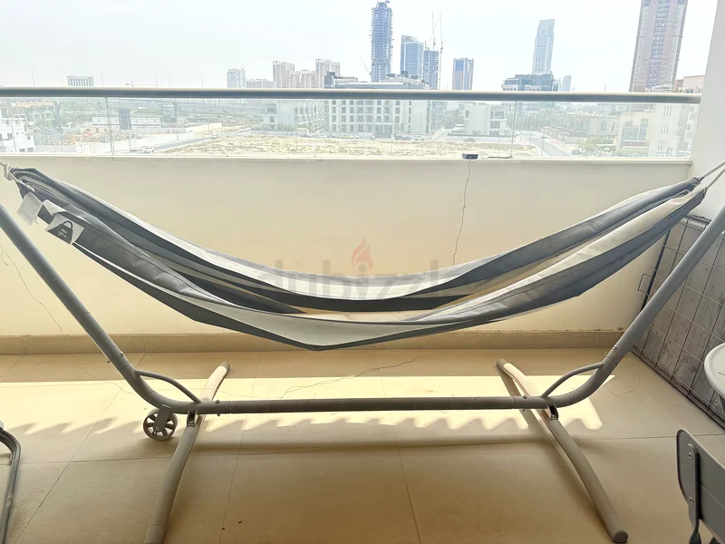 استرخِ بأناقة: أرجوحة خارجية واسعة مع حامل63189623250306111