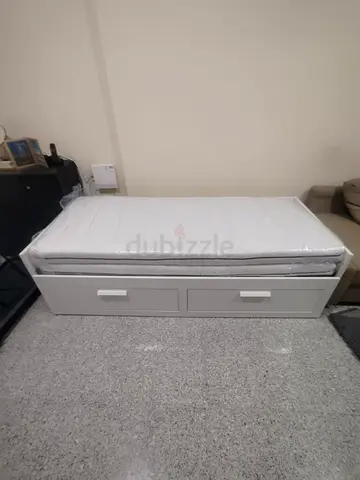 IKEA brimness Day bed with 2 storage drawers underneath and with 2 IKEA mattresses