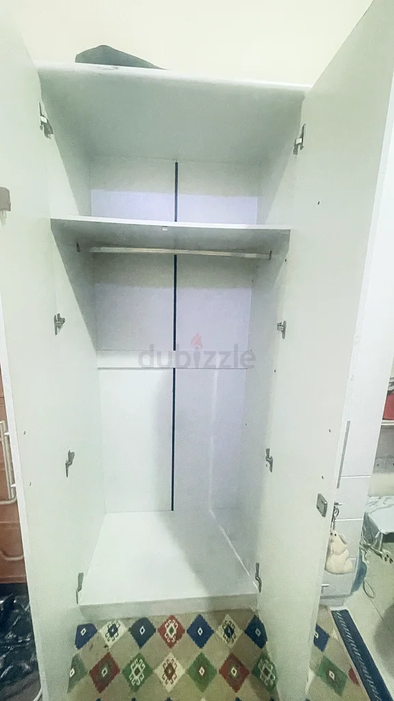 Stylish White Wardrobe with Ample Storage Space63218813336961112