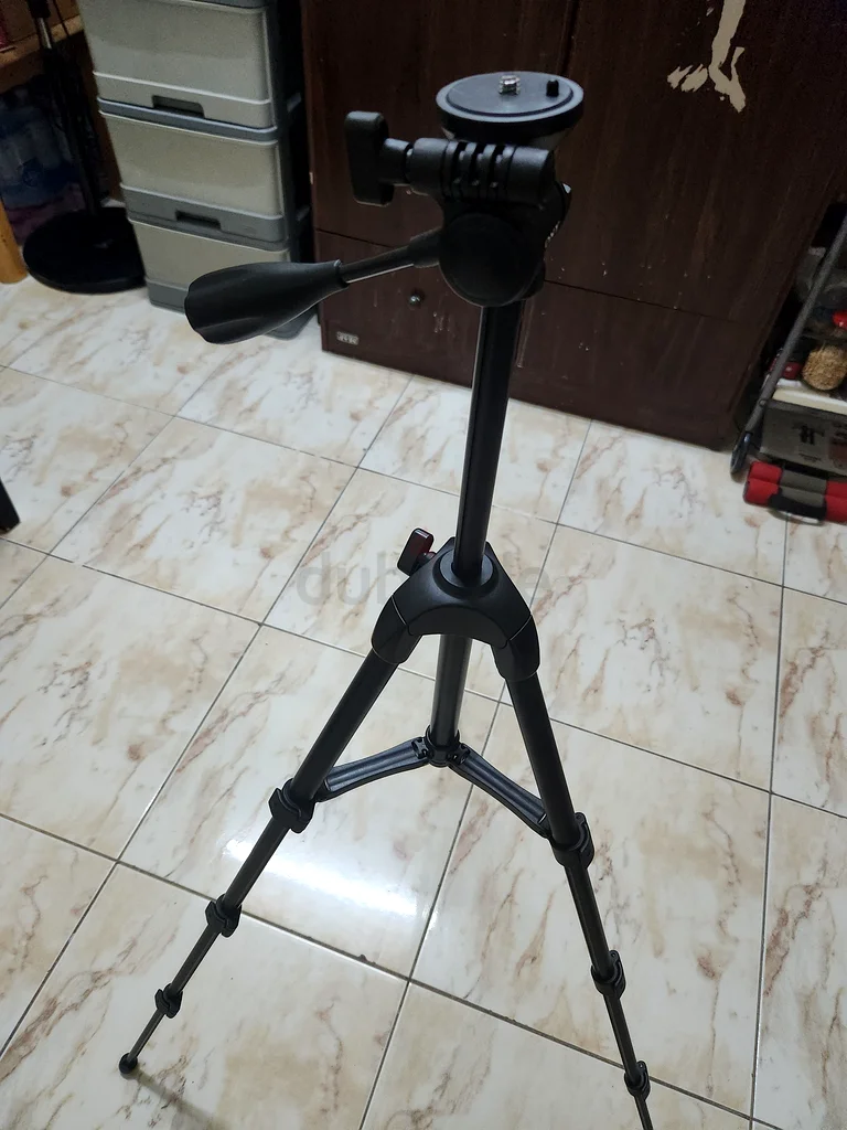 حامل ثلاثي قوي قابل للتعديل لجميع احتياجاتك في التصوير الفوتوغرافي63234613298947111