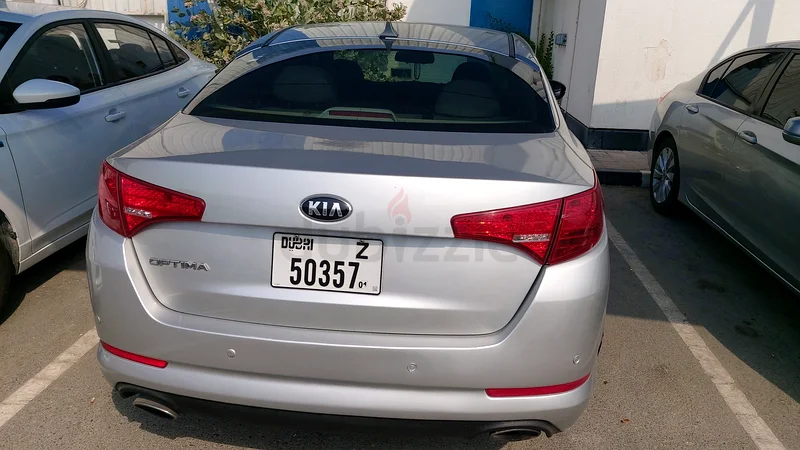Kia optima 2013 only 14000aed super condition63170837424641112
