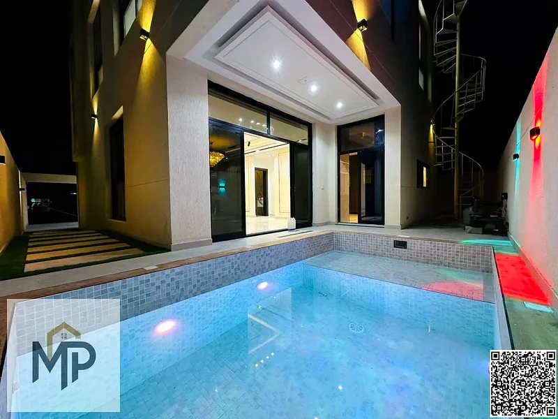 For sale, a modern villa, including registration fees, close to the mosque and services, with a seating area in the courtyard, with no down payment.63895009945473113