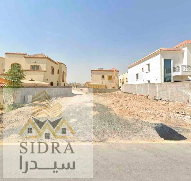للبيع: قطعة أرض تجارية بتصريح جي+1 على طريق وحارة في المويحة 1، عجمان63197611169281113