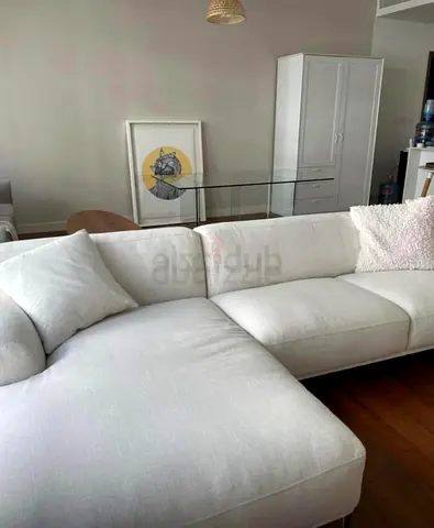 Selling perfect condition the loom collection Lshape sofa feather filled