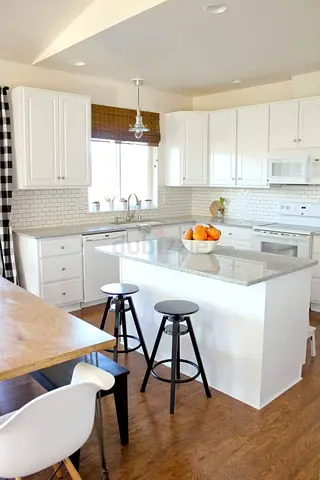 Stylish White Kitchen Island with Bar Stools